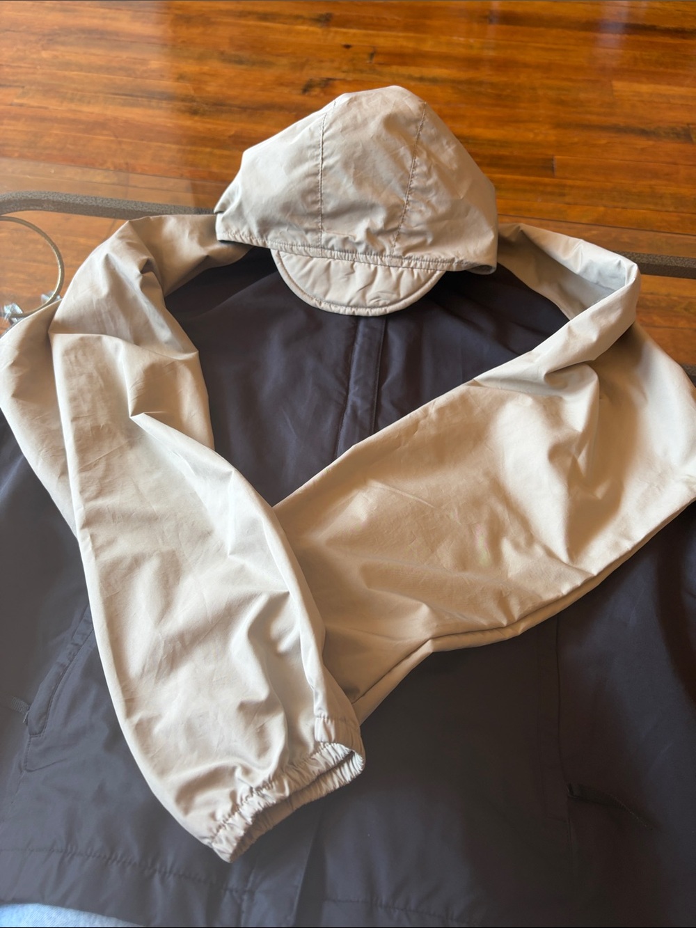 Nike Two-Tone Hooded Raincoat in Beige and Black